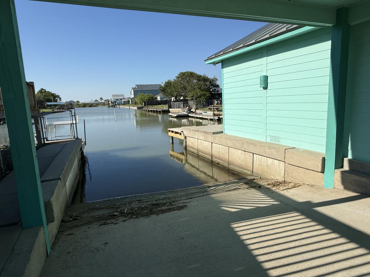 Private boat ramp into the canal that connects to Copano Bay. 