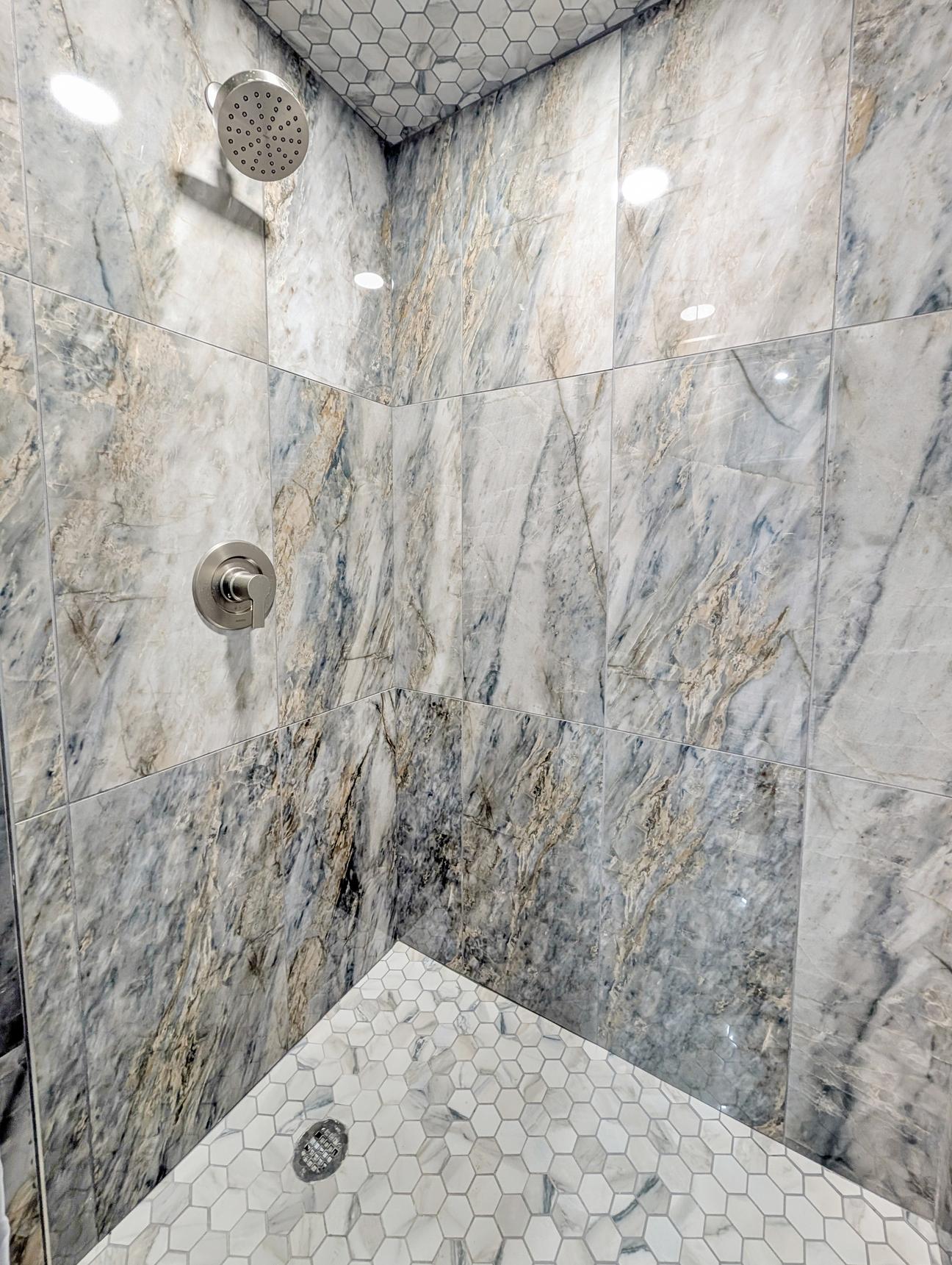 Tiled walk in shower.
