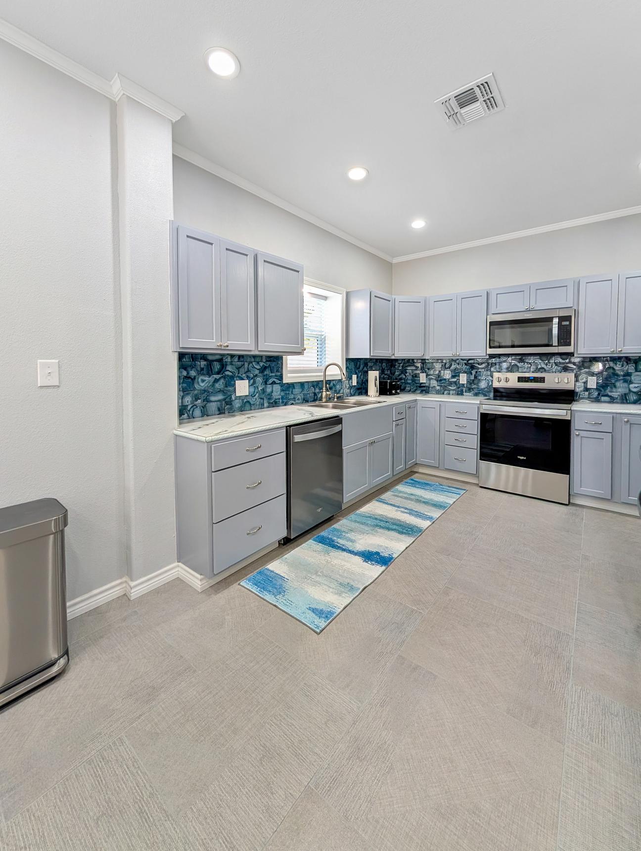 Sink, dishwasher, cupboards