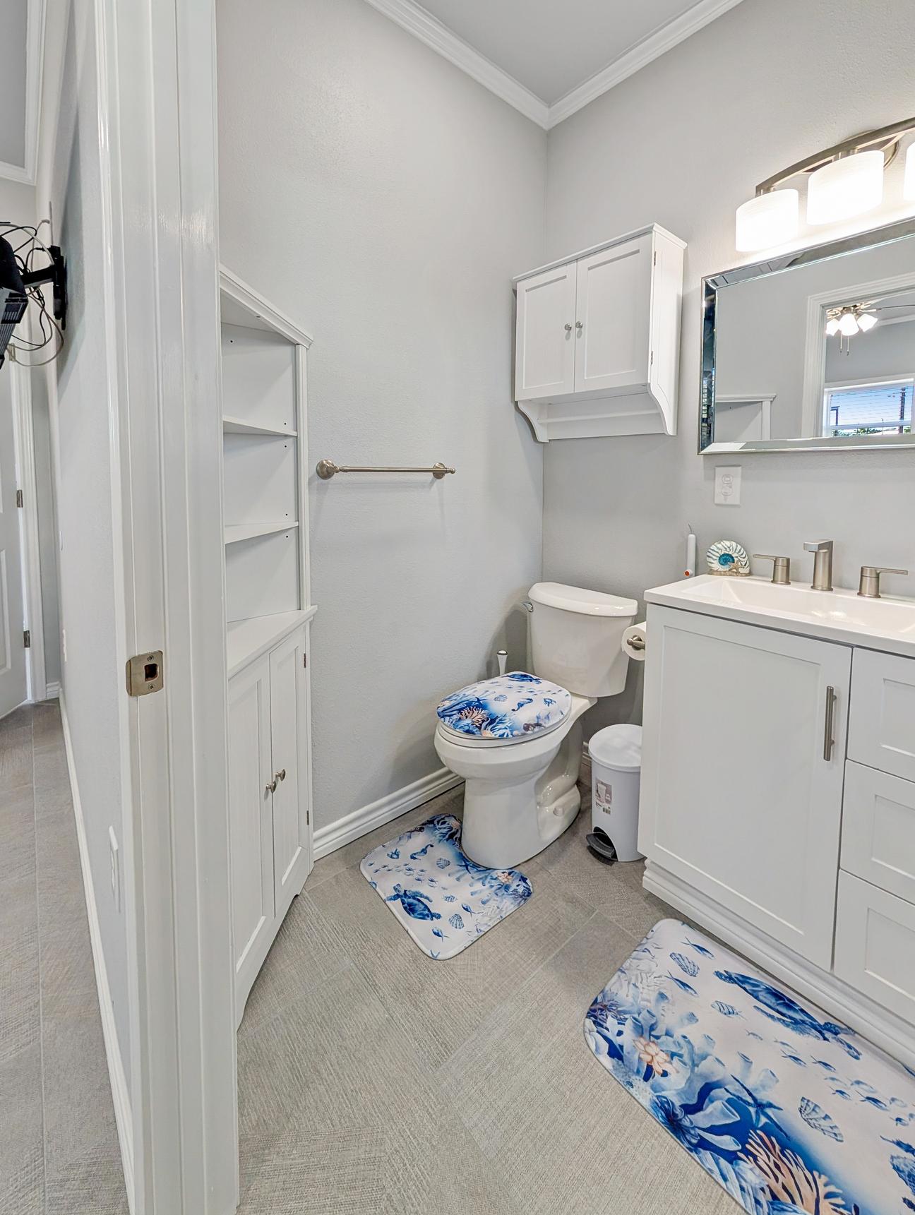 Vanity, toilet, tub-shower combo
