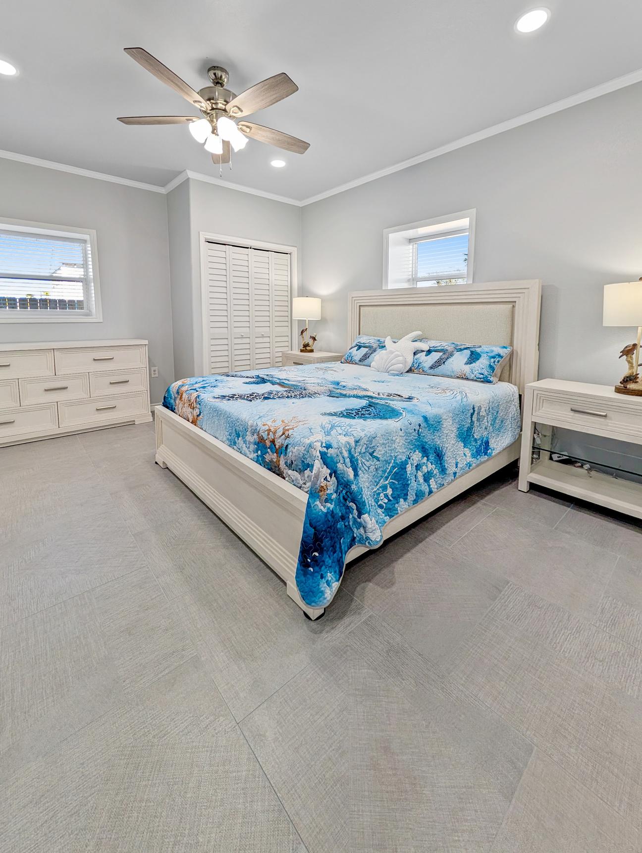 Large king bed with coastal themed decor