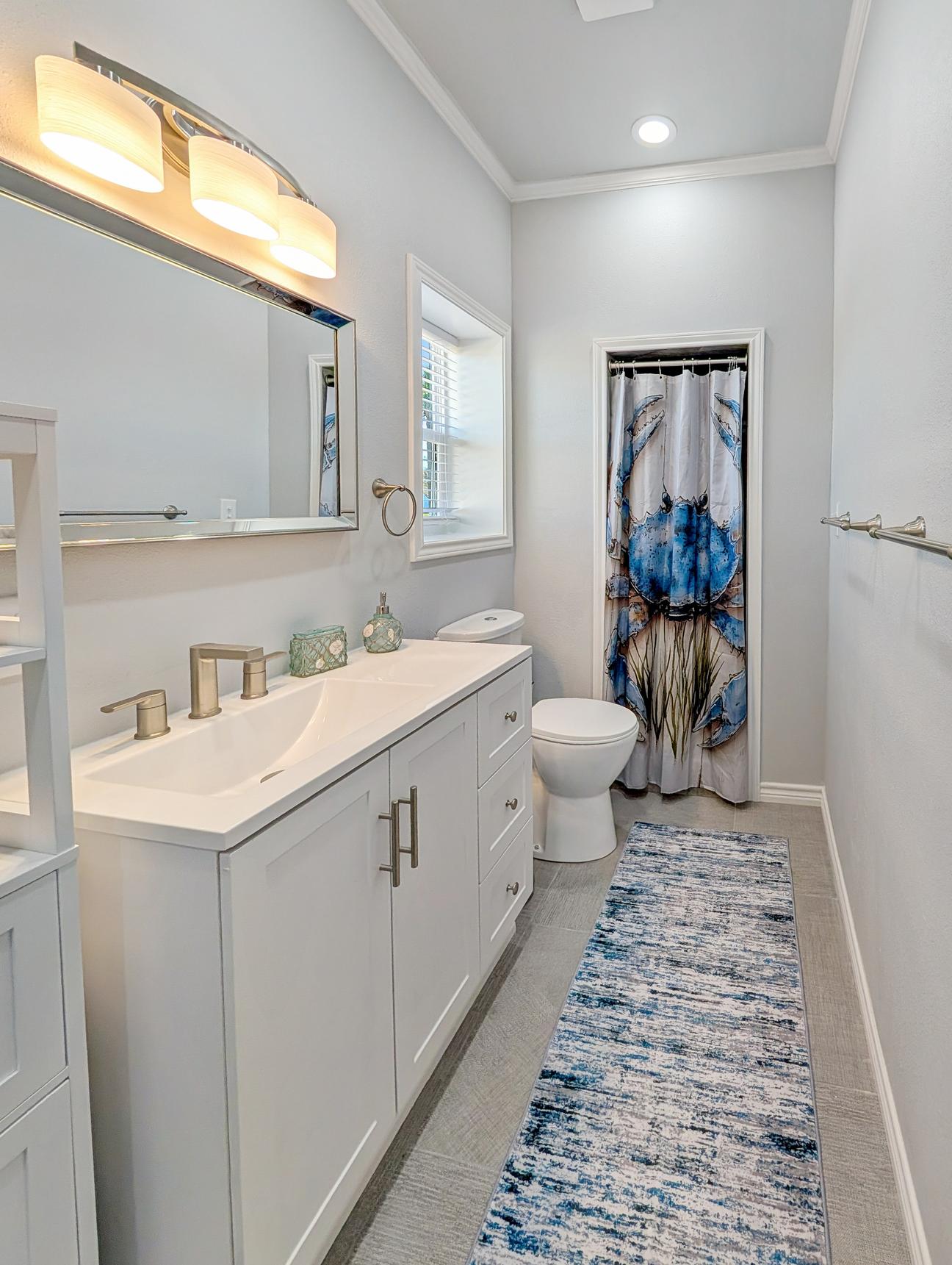 Large shared bathroom, no tub, only shower