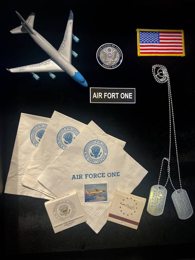 Air Fort One features unique decor items from the Air Force One Presidential plane as well as shadow boxed memorabilia from the Air Force. A tribute to those who have served.