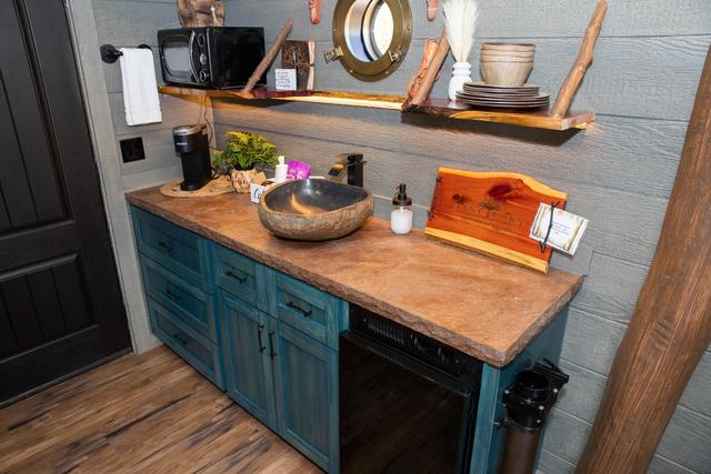 KITCHENETTE - KEURIG COFFEE MAKER - MICROWAVE - MINI FRIDGE - SERVICE WEAR - COOKING/CLEANING SUPPLIES - FIRST AID KIT - DRINK CHUTE - AND MORE