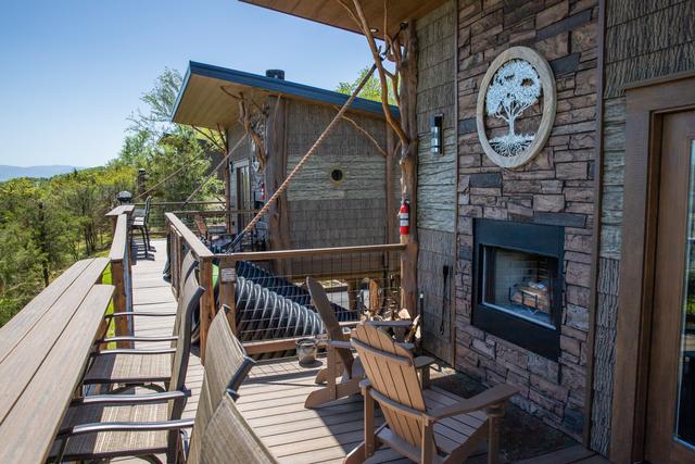 CONNECTED WITH A BRIDGE - YOU CAN GO BETWEEN TREEHOUSES - AN OASIS IN THE TREETOPS OF THE SMOKY MOUNTAINS