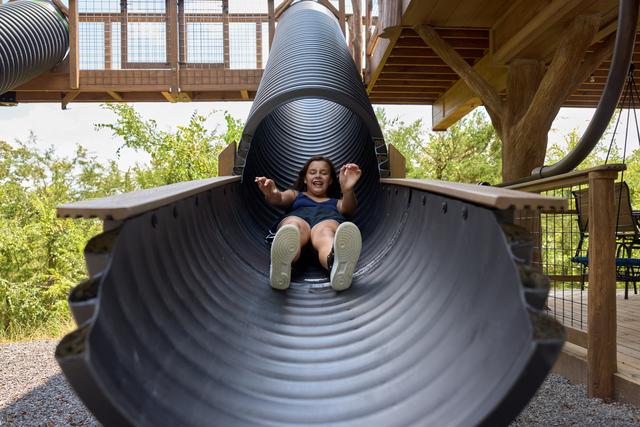 TAKE ONE OF YOUR TWO 20-FOOT SLIDES DOWN AT SANCTUARY TREEHOUSE RESORT IN THE SMOKIES