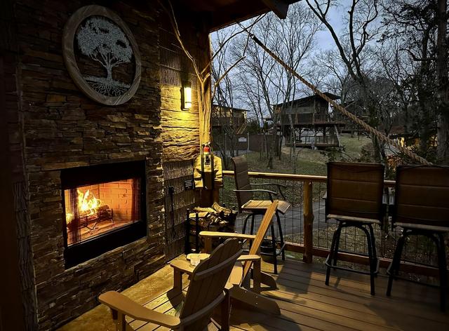 UPPER DECK - WOOD BURNING FIRE PLACE - UNLIMITED FIREWOOD/FIRE STARTER KITS - BAR TOP SEATING FOR 4 - ADIRONDACK CHAIRS - OUTDOOR BLANKETS PROVIDED