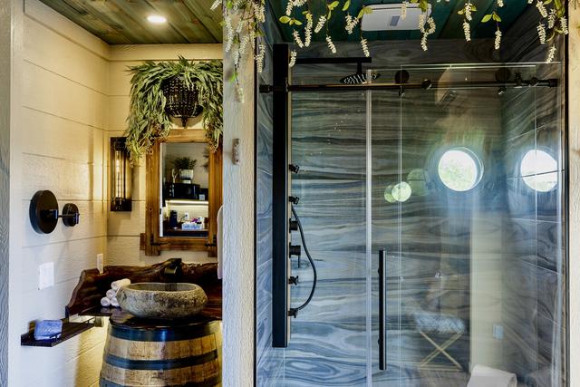 BATHROOM - TREE-T-MENT CENTER TREEHOUSE - CUSTOM TILE RAIN SHOWER - PORT HOLE WINDOW - CUSTOM VANITY SINK - LUXURY LINENS & TOILETRIES PROVIDED