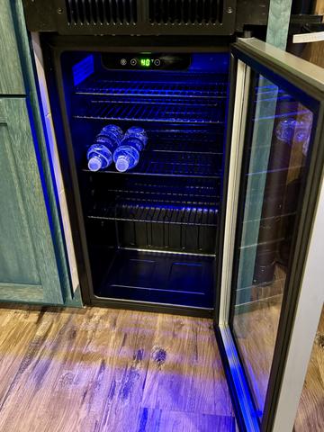 MINI FRIDGE - COMPLIMENTARY SANCTUARY TREEHOUSE RESORT BOTTLED WATER 