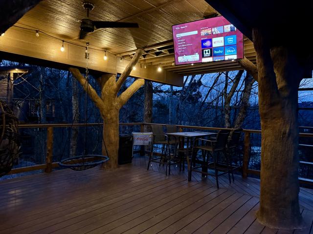 LOWER DECK NIGHT VIBES AT CHASING FIREFLIES TREEHOUSE - BISTRO LIGHTING - 50" TV