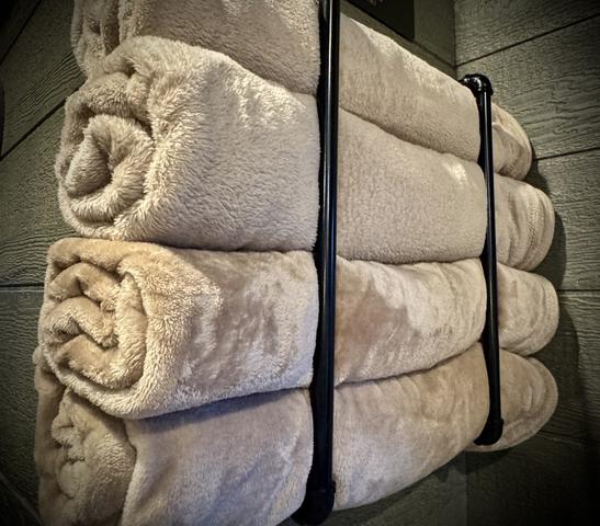 OUTDOOR BLANKETS PROVIDED FOR COZY NIGHTS BY THE FIRE AT CHASING FIREFLIES TREEHOUSE