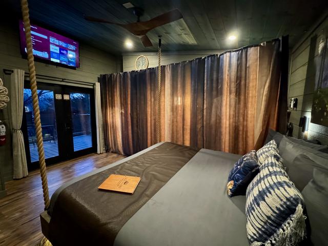 FOR PRIVACY - WE HAVE PROVIDED A ROOM DIVIDER CURTAIN TO SECTION OFF THE BATHROOM AREA