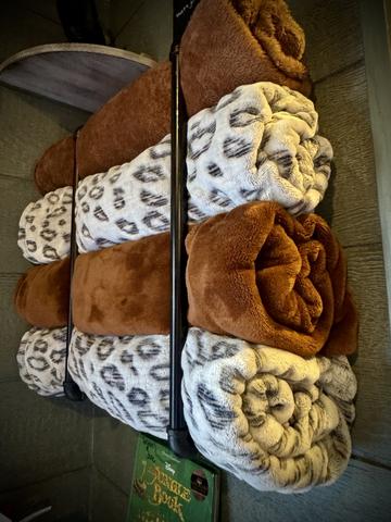 OUTDOOR BLANKETS PROVIDED FOR COZY NIGHTS BY THE FIRE AT TARZAN & JANE TREEHOUSES AT SANCTUARY TREEHOUSE RESORT IN THE SMOKIES