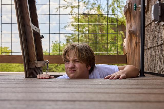 POP THROUGH ONE OF THE TWO ESCAPE HATCHES ON THE UPPER DECKS & CATCH ONE OF THE 20-FOOT SLIDES DOWN