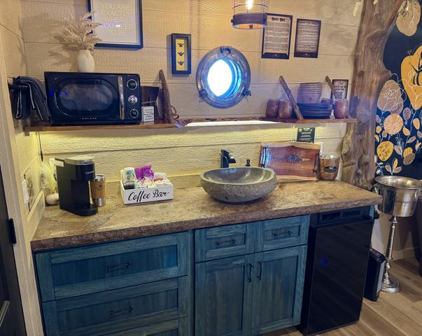 KITCHENETTE - MICROWAVE - KEURIG COFFEE MAKER - MINI FRIDGE - SERVICE WARE - COOKING/CLEANING SUPPLIES - PAPER PRODUCTS/TRASH BAGS/TOWELS/AND MORE PROVIDED