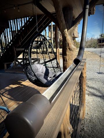 LOWER DECK DRINK CHUTE EXIT AT SQUIRRELS GONE WILD TREEHOUSE