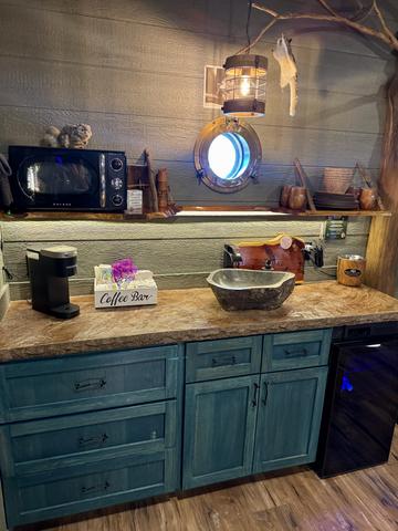 STOCKED KITCHENETTE - MICROWAVE - KEURIG COFFEE MAKER - MINI FRIDGE - SINK - SERVICE WARE - COOKING/CLEANING SUPPLIES AND MORE