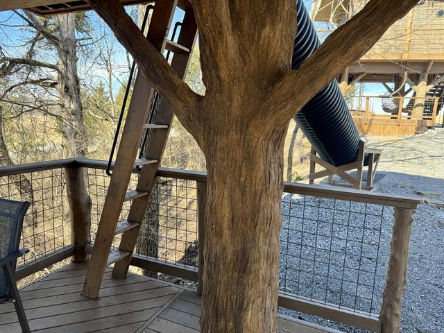 SNEAK UP THE SECRET LADDER TO THE UPPER DECK AT SQUIRRELS GONE WILD TREEHOUSE