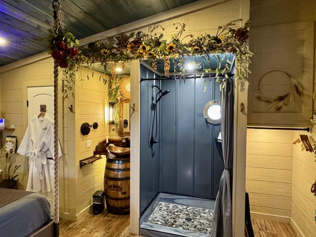 BATHROOM - RAIN SHOWER - PORT HOLE WINDOWS - CUSTOM TILE - CLOSET - TOILET CLOSET - HEATED/LIT TOILET - AMONG THE WILDFLOWERS TREEHOUSE