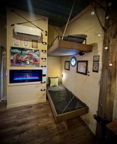 DOUBLE BUNK SET - LED FIREPLACE - LUXURY LINENS & SLEEPING BAGS PROVIDED - PORT HOLE WINDOWS - USB CHARGE PORTS - READING LIGHTS