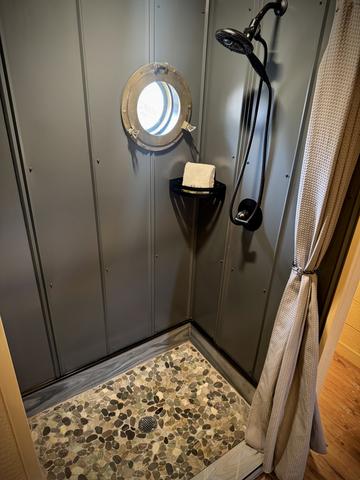 RAIN SHOWER - CUSTOM TILE - PORT HOLE WINDOW - LUXURY LINENS & TOILETRIES PROVIDED