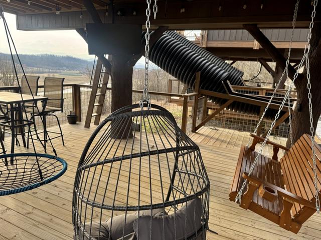 LOWER DECK - LAND OF THE FREE - HOME OF THE BRAVE - TREEFORT DOUBLE TREEHOUSES AT SANCTUARY TREEHOUSE RESORT IN THE SMOKIES!