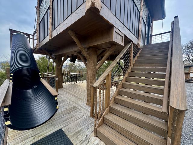 2 LOWER DECKS - TWO 20-FOOT SLIDES - LAND OF THE FREE - HOME OF THE BRAVE TREEHOUSES AT SANCTUARY TREEHOUSE RESORT IN THE SMOKIES