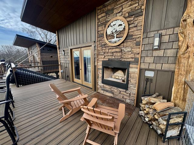 UPPER DECKS VIEW - WOOD BURNING FIREPLACE - UNLIMITED FIREWOOD - SANCTUARY TREEHOUSE RESORT IN THE SMOKIES