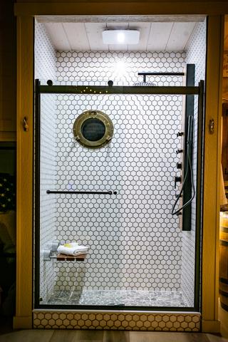 CUSTOM TILE SHOWER - TEAK SEAT - BAMBOO JET SHOWER - TOWEL WARMER - PORT HOLE WINDOW - LUXURY LINENS & TOILETRIES PROVIDED