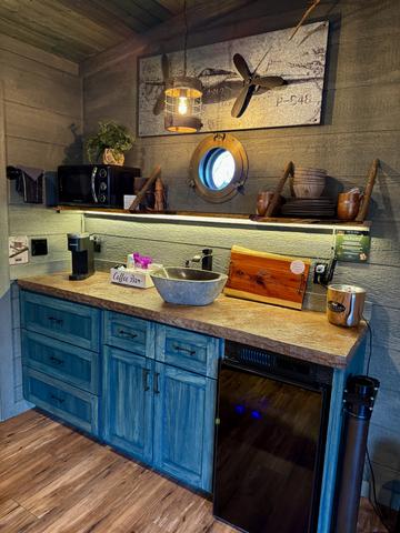 KITCHENETTE - MICROWAVE, MINI FRIDGE, DRINK CHUTE, STOCKED COFFEE CADDY, ICE BUCKET, CHARCUTERIE BOARD, FIRST AID KIT, SERVICE WARE, FLASHLIGHTS, TELESCOPE, AND MORE