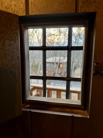 SPEAK EASY FRONT DOOR AT AIR FORT ONE TREEHOUSE