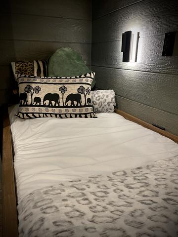 LOWER BUNKS ARE EQUIPPED WITH LUXURY BEDDING, READING LIGHTS, USB CHARGE PORTS, PORT HOLE WINDOWS