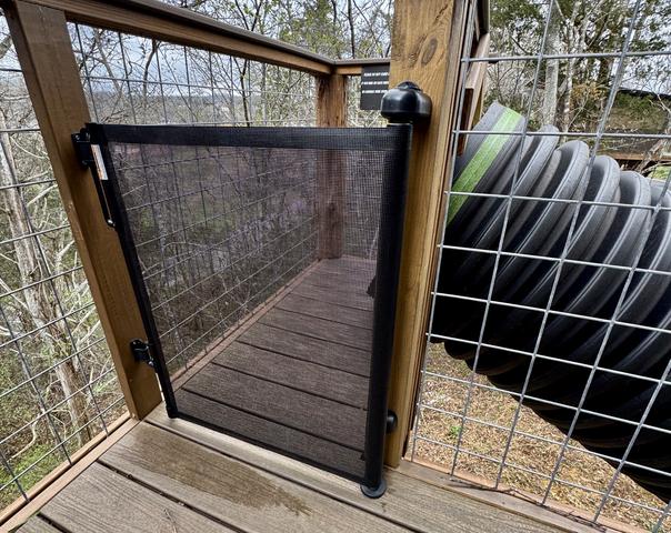 FOR SAFETY, WE HAVE ADDED A RETRACTABLE SLIDE GATE FOR GUEST USE