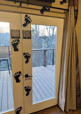 FRENCH DOORS LEADING TO THE UPPER DECK