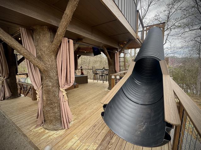 20-FOOT SLIDE AT PARTON MY MOUNTAINS LUXE TREEHOUSE IN THE GREAT SMOKY MOUNTAINS