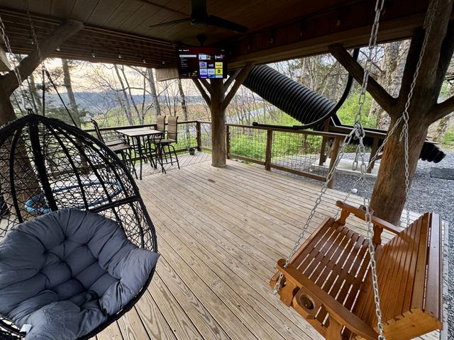 LOWER DECK - SWINGS AND THINGS - 50" TV - SLIDE ACCESS - SECRET LADDER - ESCAPE HATCH
