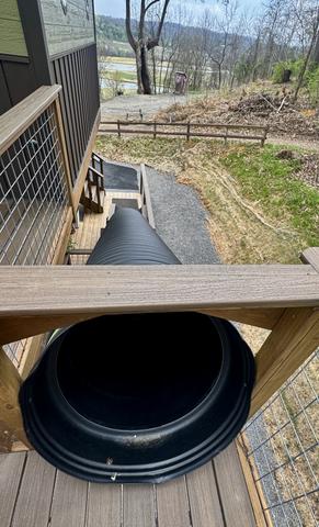 20-FOOT SLIDE DOWN AT THE FOUR TREE-SONS LUXE TREEHOUSE AT SANCTUARY TREEHOUSE RESORT