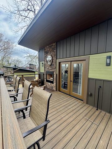 UPPER DECK - BAR TOP SEATING FOR 4 - GAS WEBER GRILL - ADIRONDACK CHAIRS - FRENCH DOORS - UNLIMITED FIREWOOD - OUTDOOR WOOD BURNING FIREPLACE