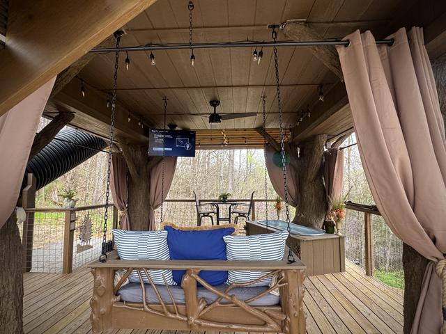 LOWER DECK - OUTDOOR DAY BED SWING - 50" TV - DRINK CHUTE - SECRET LADDER - BISTRO LIGHTS - PRIVACY CURTAINS - 20-FOOT SLIDE