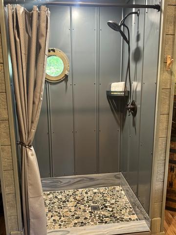 RAIN SHOWER - CUSTOM TILE FLOOR - PORT HOLE WINDOW - LUXURY LINENS & TOILETRIES PROVIDED