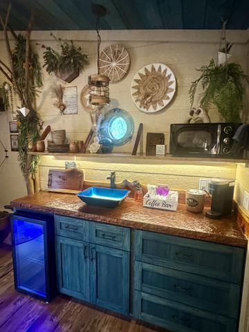 STOCKED KITCHENETTE - MICROWAVE - MINI FRIDGE - KEURIG COFFEE MAKER - COMPLIMENTARY K-CUPS - STOCKED COFFEE BAR - SERVICE WARE - COOKING/CLEANING SUPPLIES - FIRST AID KIT - AND MORE