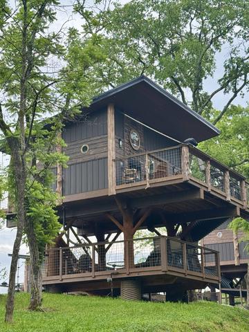 AMONG THE WILDFLOWERS TREE FORT TREEHOUSE AT SANCTUARY TREEHOUSE RESORT IN THE SMOKY MOUNTAINS