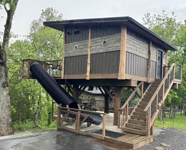 AMONG THE WILDFLOWERS TREE FORT TREEHOUSE AT SANCTUARY TREEHOUSE RESORT IN THE SMOKY MOUNTAINS
