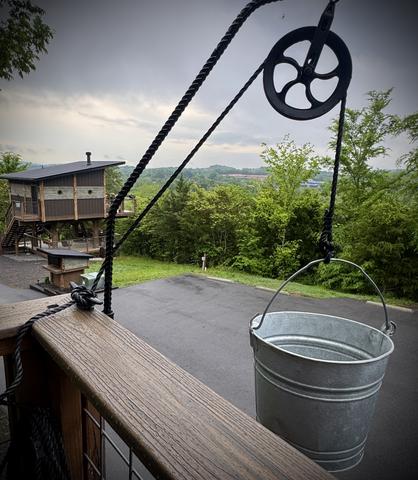 RAISE AND LOWER YOUR FAVORITE SNACKS AND BEVERAGES WITH THE BUCKET PULLEY