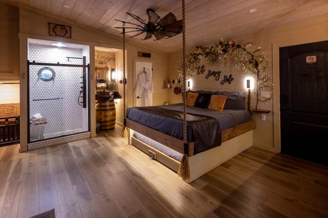 COZY UP IN THE SMOKIES IN HONEY HOLE LUXE TREEHOUSE ONLY AT SANCTUARY TREEHOUSE RESORT