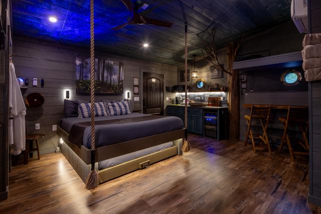 ROPE SUSPENDED KING BED - CHASING FIREFLIES TREE FORT TREEHOUSE - SANCTUARY TREEHOUSE RESORT
