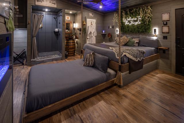 TURN THE WHEEL ON THE WALL AND REVEAL A SECRET ROLL OUT QUEEN BED (1 IN EACH TREEHOUSE)- LUXURY LINENS PROVIDED