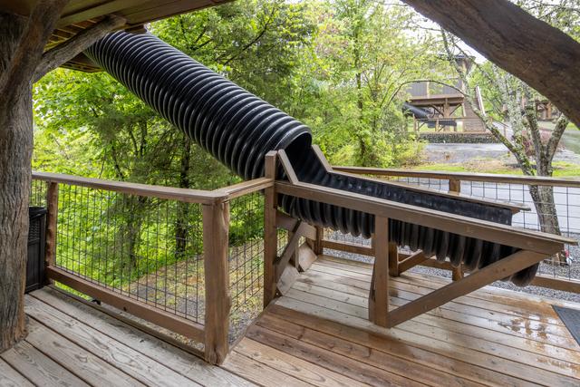 LOWER DECK 20-FOOT SLIDE EXIT - AIR FORT ONE TREE FORT TREEHOUSE - SANCTUARY TREEHOUSE RESORT