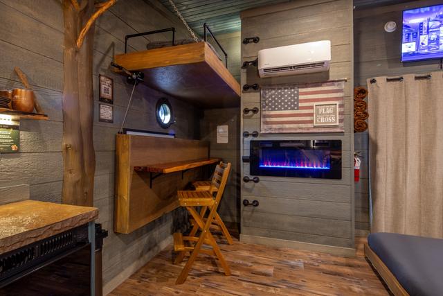 CRANK UP THE LOWER BUNK FOR ONE OF OUR INTERACTIVE FURNITURE FEATURES - ONLY AVAILABLE AT SANCTUARY TREEHOUSE RESORT