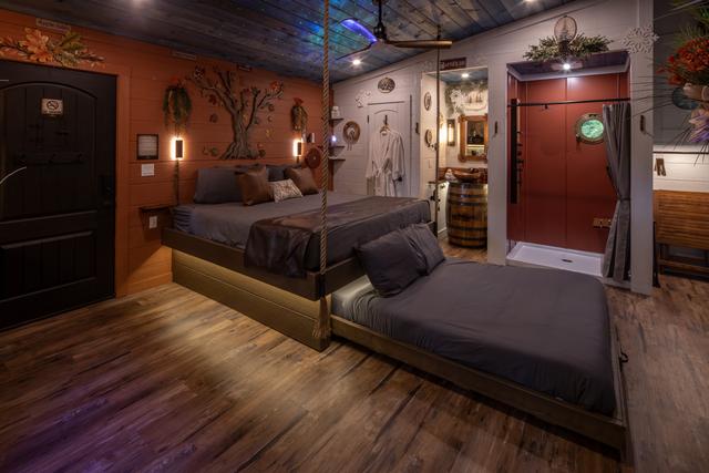 ROPE SUSPENDED KING BED - SECRET ROLL OUT QUEEN BED - TURN THE WHEEL ON THE WALL AND REVEAL A COMFY QUEEN BED OR A COUCH - LUXURY BEDDING PROVIDED